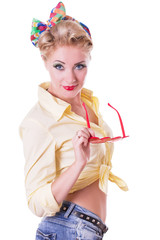 Pretty red-heaed pinup woman with glasses