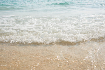 Fototapeta na wymiar Sand and blue sea