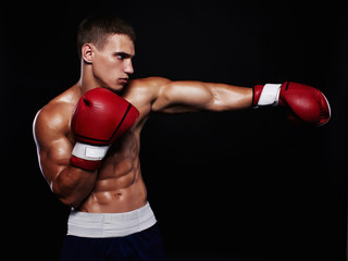 Fototapeta na wymiar boxer man is fighting