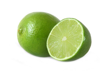 cut and whole lime fruits isolated on white background with clip