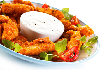 Fried chicken nuggets and vegetables