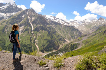 Fototapeta premium A girl traveling in the mountains of Caucasus