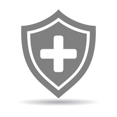 Medical health concept. Isolated grey shiel with cross on white background. First aid and healthcare.