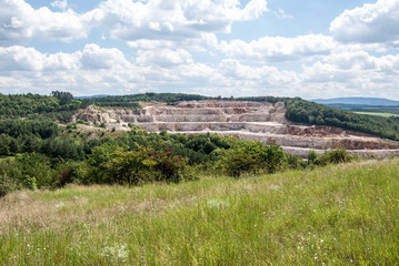 Fototapeta na wymiar giant limestone quarry named Certovy schody in Cesky kras region in Central Bohemia