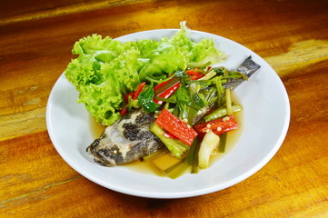 steamed sand goby fish with soy sauce on plate