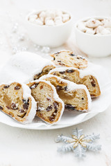 Christmas Stollen on a plate and cocoa, vertical