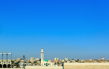 Fototapeta na wymiar View of al Khader town against clear sky