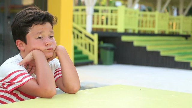 Portrait of a depressed preteen boy