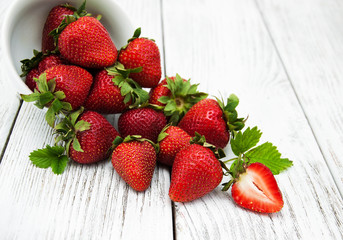 ripe strawberries on wooden table