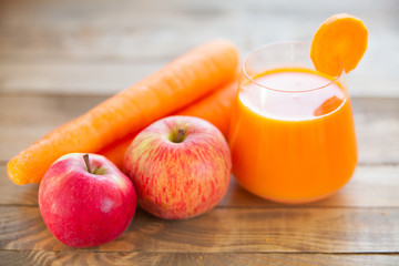 Carrot juice in glass on  table