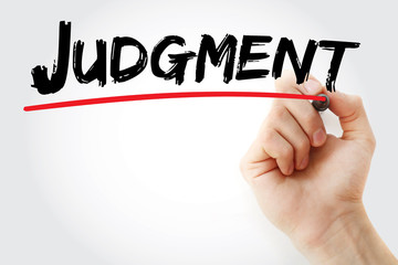 Hand writing Judgment with marker, concept background