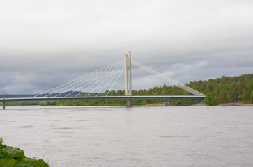 Fototapeta na wymiar Candle of rafts man bridge in Rovaniemi