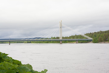 Candle of rafts man bridge in Rovaniemi