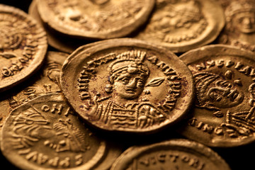 Ancient gold Byzantine coins with emperor portraits