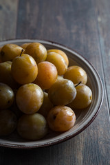 Fresh plums on a plate