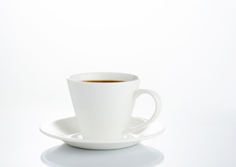 Obraz premium Coffee cup and saucer on a white background