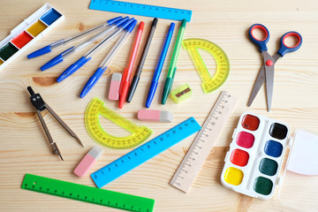 School supplies on a wooden background
