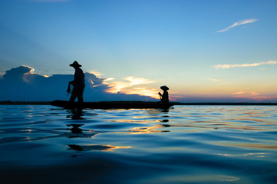 asian fisherman silhouette