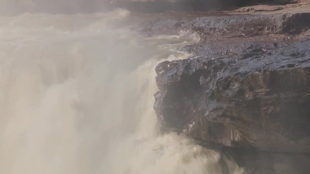 View to the Hukou waterfall at Yellow river (Huang He) in Yichuan, China. Hukou is the largest waterfall at Yellow river and the second largest in China.