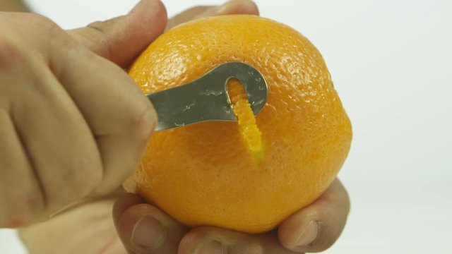 Peeling an orange skin