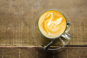 Swan Latte Art on the Wood Table