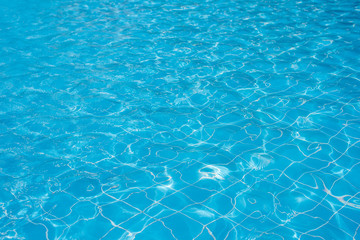 Swimming pool with sunny reflections