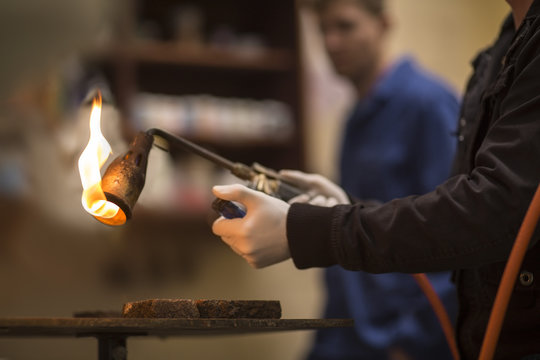 Man holding welding torch