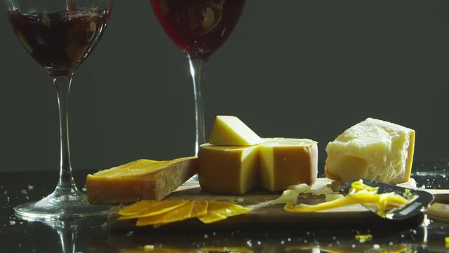 Pouring wine with cheese plate