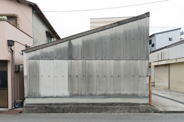 Large blank billboard on a street wall, banners with room to add your own text