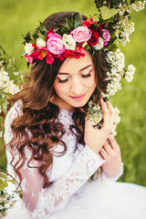 Naklejka premium Beautiful bride on a swing