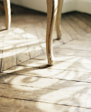 Shadows on wooden floor