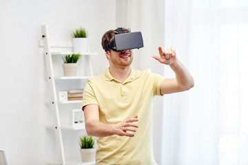 young man in virtual reality headset or 3d glasses