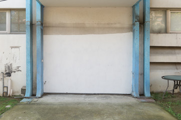 Large blank billboard on a street wall, banners with room to add your own text