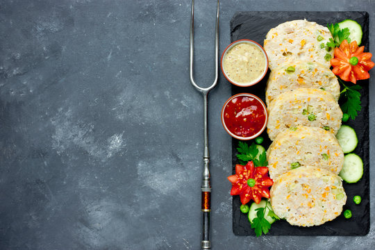 Festive meat roll with green peas and carrot