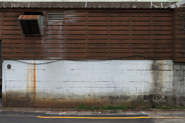 Large blank billboard on a street wall, banners with room to add your own text