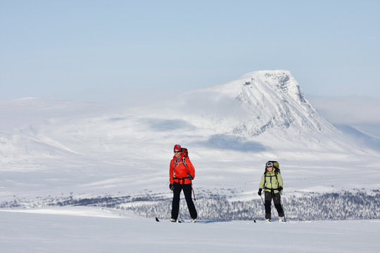 Two women doing cross country skiing, Ammarnas, Lapland, Sweden