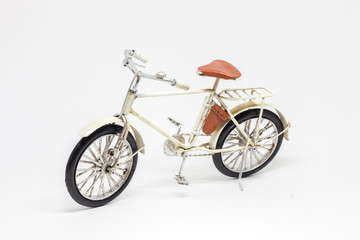 Fototapeta na wymiar Hand made white bicycle model isolated on white background