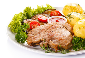 Grilled steak, boiled potatoes and vegetable salad