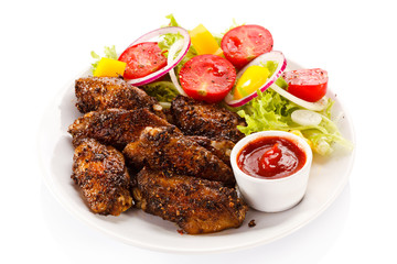 Grilled chicken wings and vegetables 