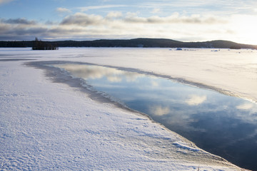 A wintry landscape in Finland during a sunny day in the winter. Image taken in February. 
