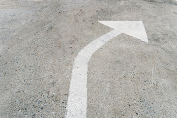 White arrow on the road