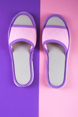Home slippers for women on a bright background. Flat lay.