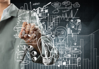 Woman sketching business ideas 