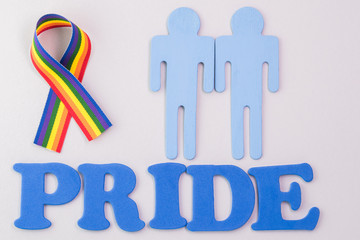 Homosexual symbol stylized gay couple and rainbow ribbon awareness.