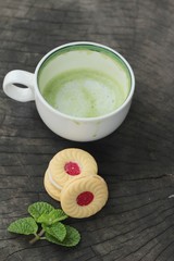 Strawberry biscuits with green tea is delicious.