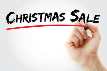 Hand writing Christmas SALE with marker, concept background