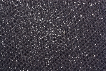 Pieces of dandruff on clothes
