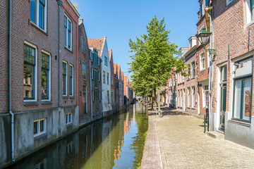 Fototapeta na wymiar Houses and quay of Kooltuin canal in Alkmaar, North Holland, Netherlands