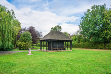 Old wooden rain shelter in public park