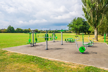 Outdoor fitness equipment in public park.
